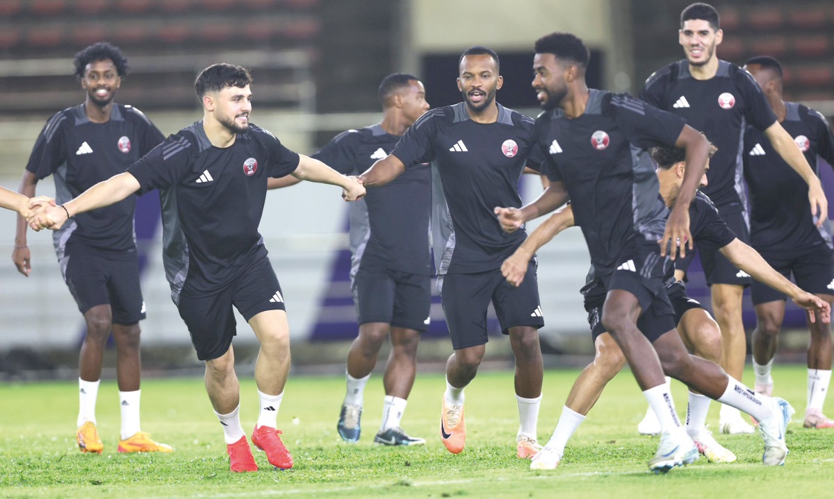 Qatar players during a training session on the eve of the FIFA World Cup 2026 Asian Qualifier against North Korea in Vientiane, Laos.