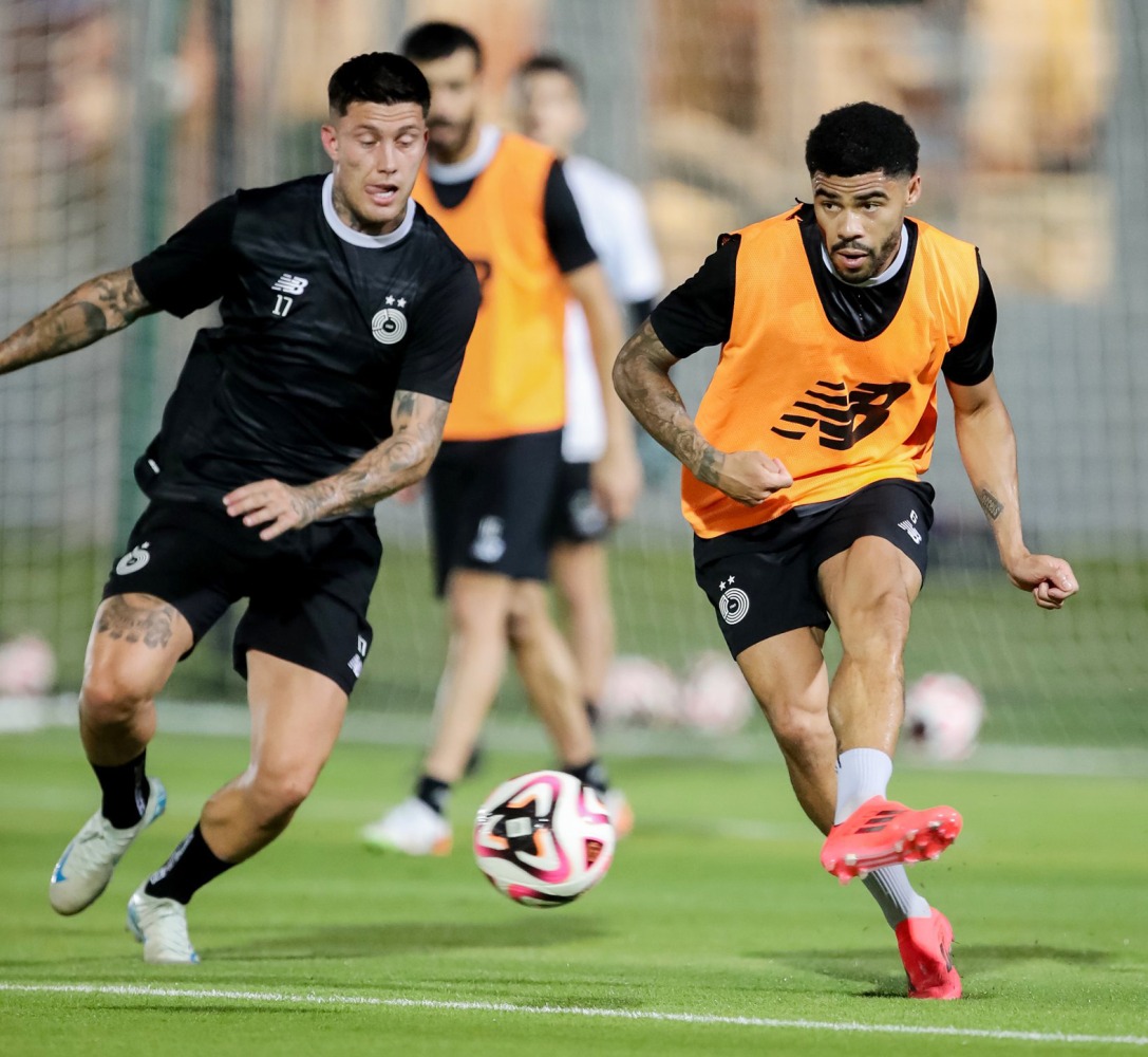 Al Sadd players in action during a training session.