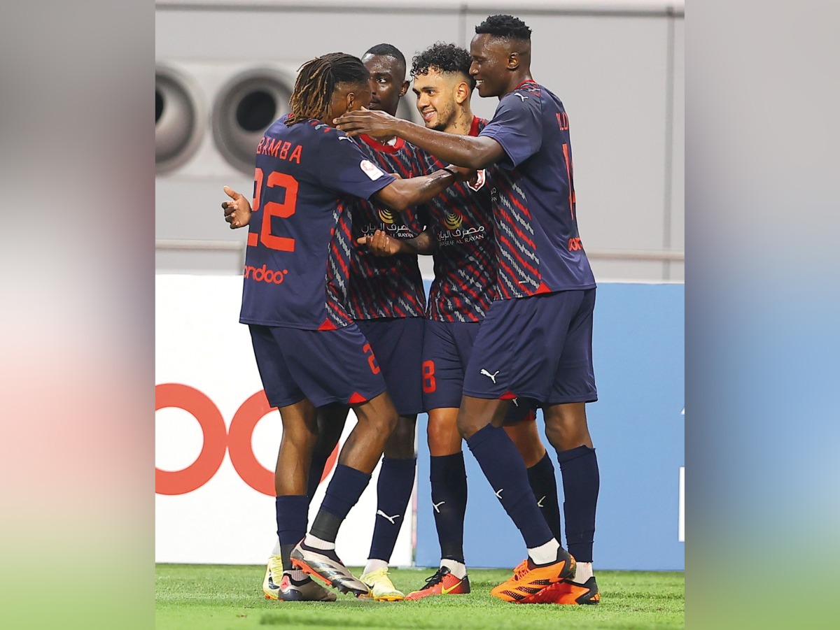 From left: Al Duhail's Ibrahima Bamba, captain Almoez Ali, Edmilson Junior and Michael Olunga celebrate during match against Al Sadd yesterday.