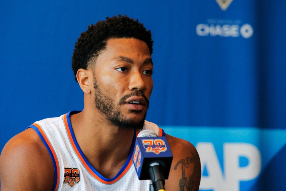 (Files) Derrick Rose speaks during a press conference on September 26, 2016 in White Plains, New York. (Photo by Eduardo Munoz Alvarez / AFP)