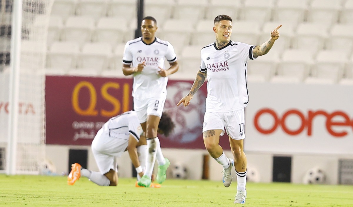 Al Sadd's Cristo González celebrates after scoring his team's second goal. 