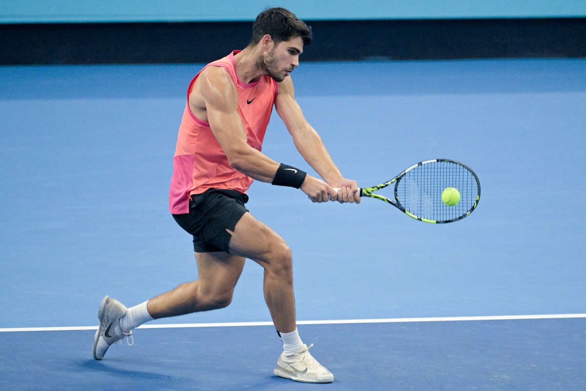 Spain’s Carlos Alcaraz hits a return to Netherlands’s Tallon Griekspoor during their men's singles match at the China Open tennis tournament in Beijing on September 29, 2024. (Photo by Jade Gao / AFP)
