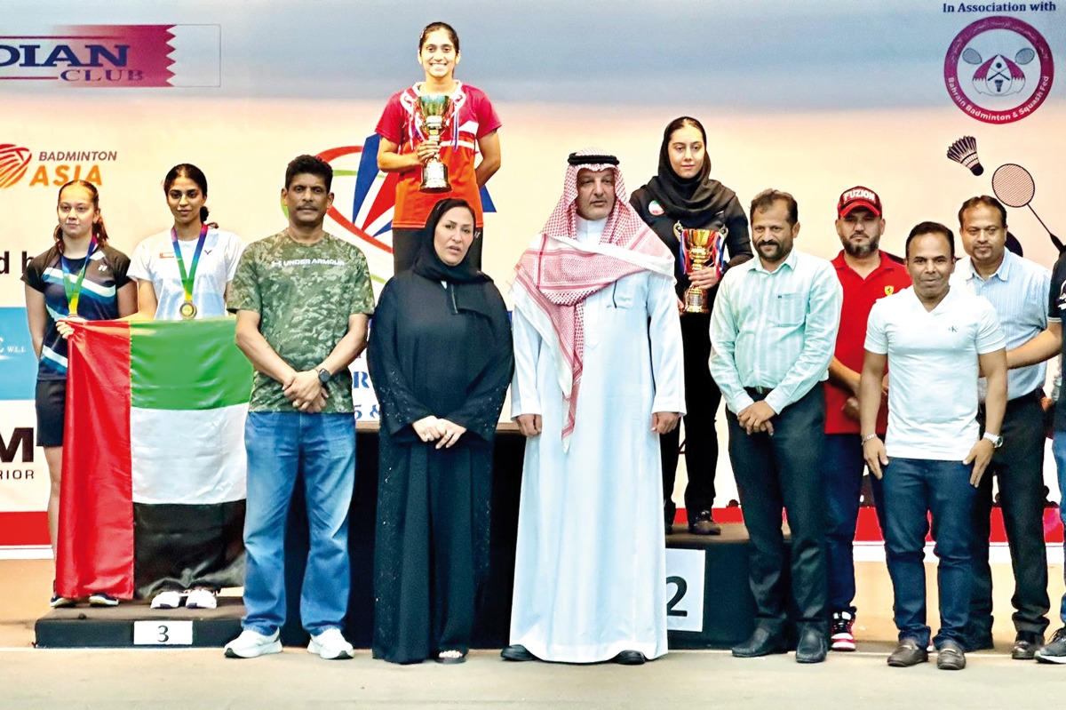 Officials and staff with the winning young athletes during the award ceremony.