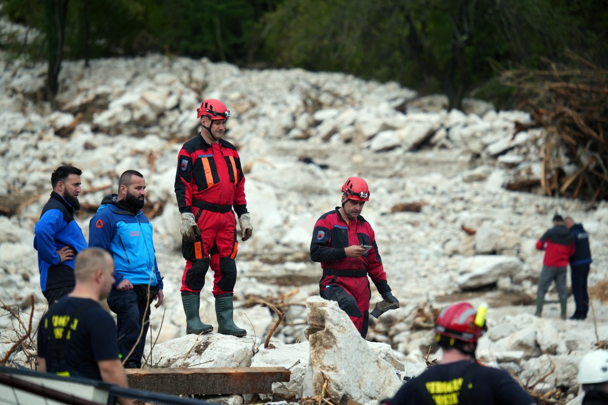 Rescuers search for survivors near Neretva river canyon, following heavy rains in the village of Donja Jablanica, about 50 kilometres south-west of Sarajevo on October 5, 2024. Photo by ELVIS BARUKCIC / AFP