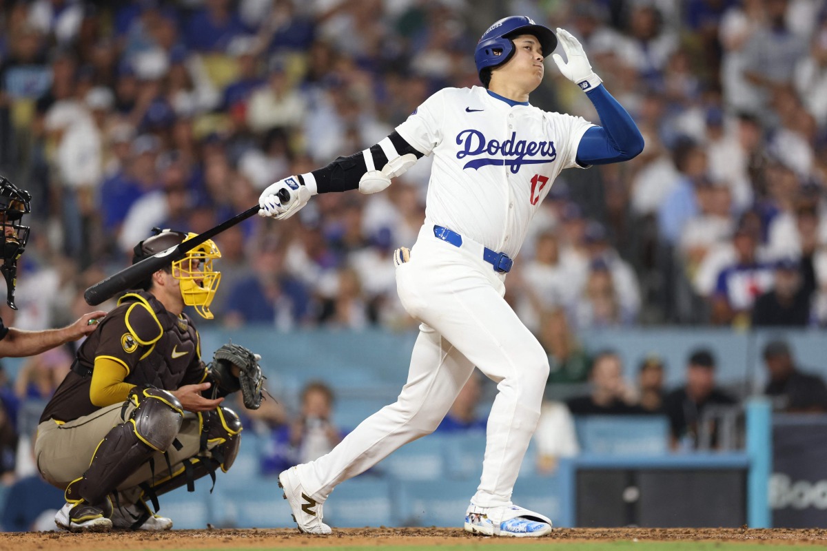 Shohei Ohtani #17 of the Los Angeles Dodgers strikes out against the San Diego Padres during the sixth inning of Game Five of the Division Series at Dodger Stadium on October 11, 2024 in Los Angeles, California. (Photo by Sean M. Haffey / GETTY IMAGES NORTH AMERICA / Getty Images via AFP)
