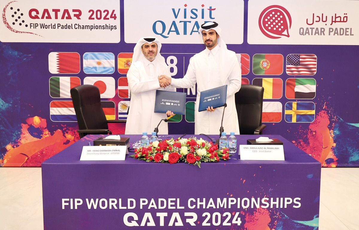 Qatar Tennis, Squash, Badminton and Padel Federation Secretary General Tareq Zainal (left) and Visit Qatar CEO Abdulaziz Al Mawlawi during the sponsorship signing ceremony yesterday.