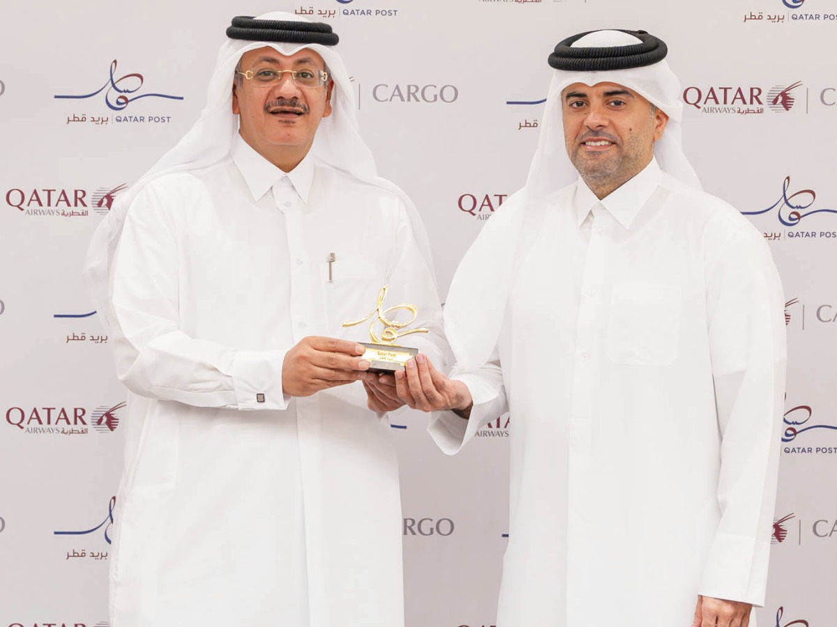 Qatar Airways Group Chief Executive Officer, Engr. Badr Mohammed Al Meer (right) and Qatar Post Chairman and Managing Director, Faleh bin Mohammed Al Naemi at the agreement signing.