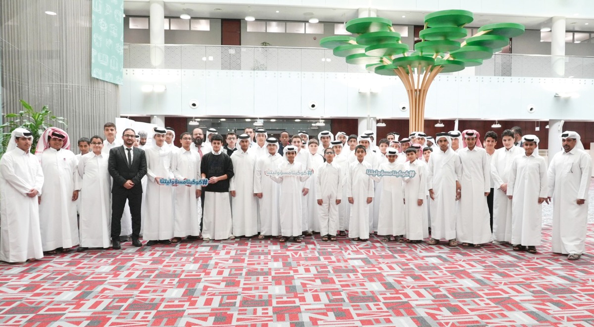 School students and officials during the programme. 