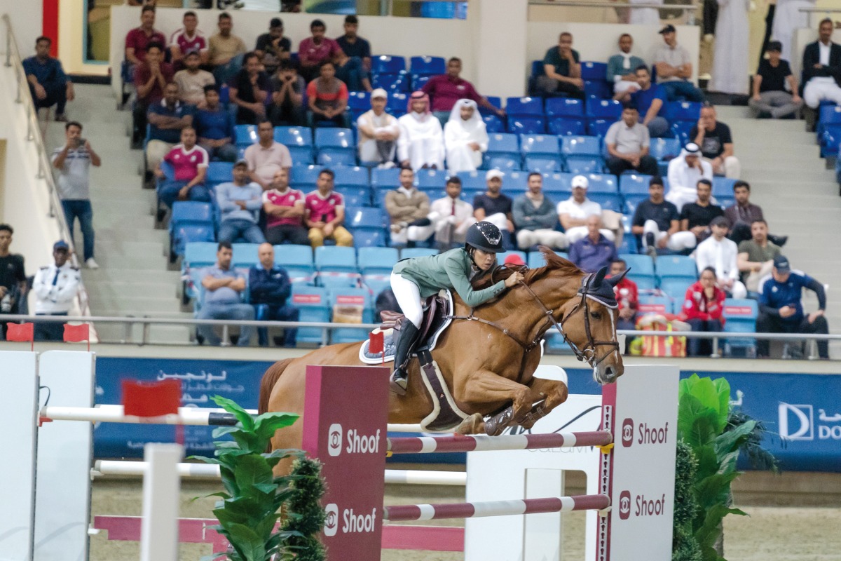 Cyrine Cherif guides Van Gallettana Z over a fence. 