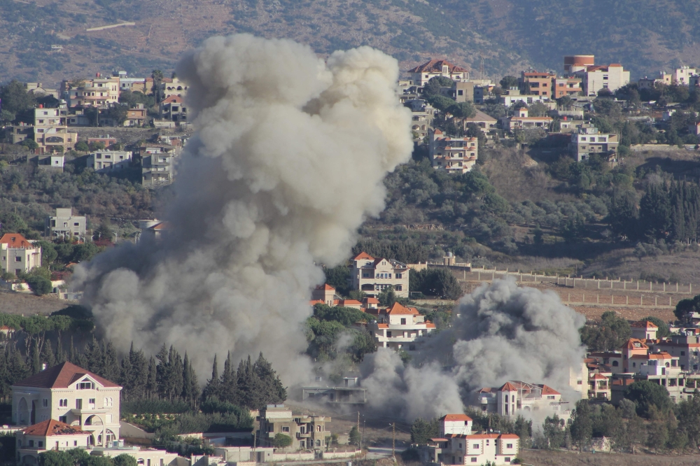 Smoke rises from the site of an Israeli airstrike that targeted the southern Lebanese village of Khiam on October 21, 2024. (Photo by AFP)

