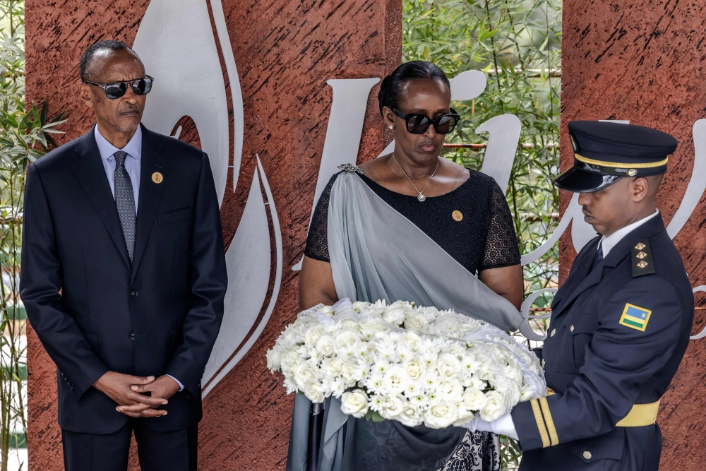 File photo used for demonstration purposes. President of Rwanda Paul Kagame and First Lady of Rwanda Jeannette Kagame look on as a member of the Rwandan Military Band carries a wreath during the commemorations of the 30th Anniversary of the 1994 Rwandan genocide at the Kigali Genocide Memorial in Kigali on April 7, 2024. Photo by LUIS TATO / AFP.