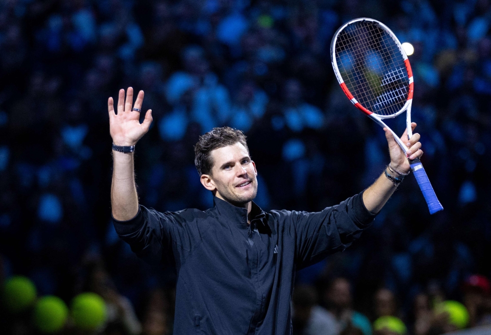 Austria's Dominic Thiem waves after playing his final match at the Vienna Open at the Stadthalle in Vienna, Austrian on October 22, 2024. (Photo by GEORG HOCHMUTH / APA / AFP) 