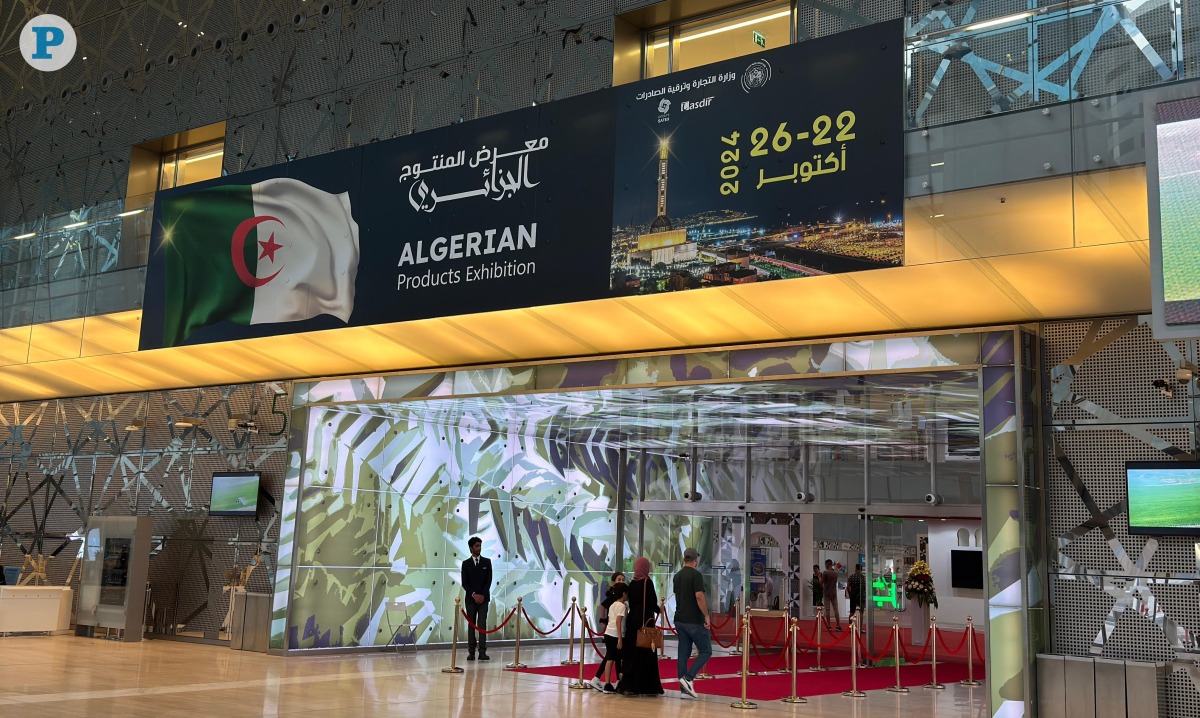 Visitors entering the Algerian exhibition at DECC, October 26, 2024. Photo by Oussama Abbassi.