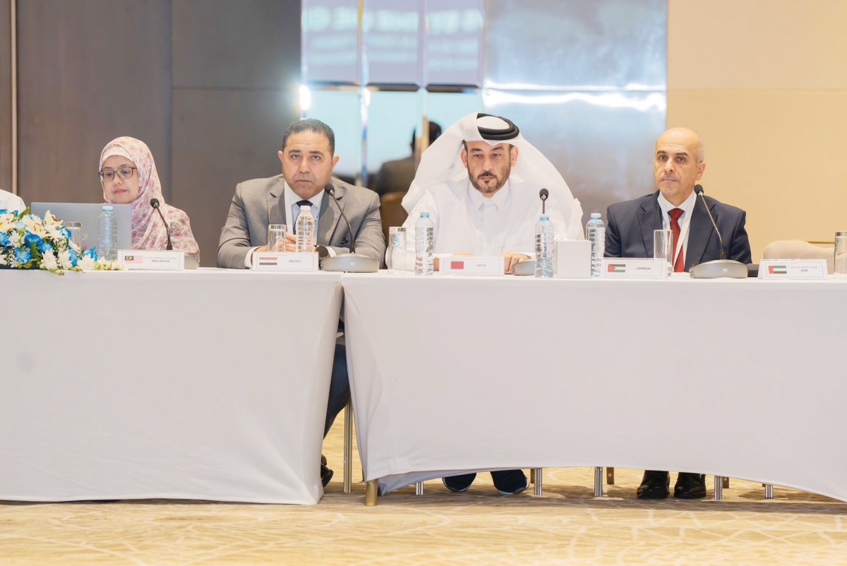 National Cyber Security Agency President H E Eng. Abdulrahman bin Ali Al Farahid Al Malki (second right) and other participants at the event.