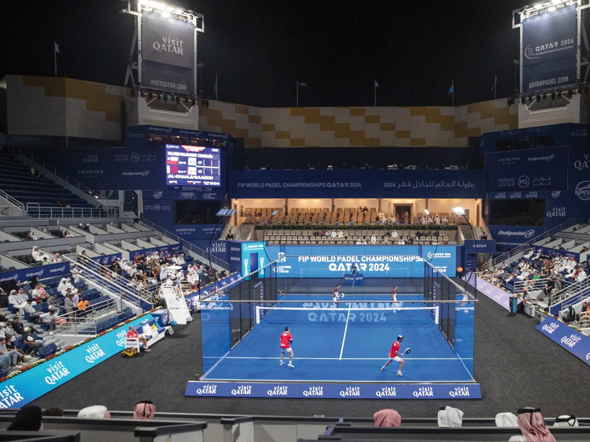 Action during the Group C match between Qatar and Chile at the Khalifa International Tennis & Squash Complex yesterday.