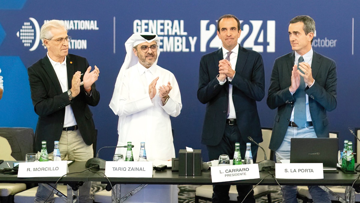 QTSBF Secretary-General Tariq Darwish Zainal (second left) and FIP President Luigi Carraro (third left) with other officials during the FIP General Assembly in Doha, yesterday.