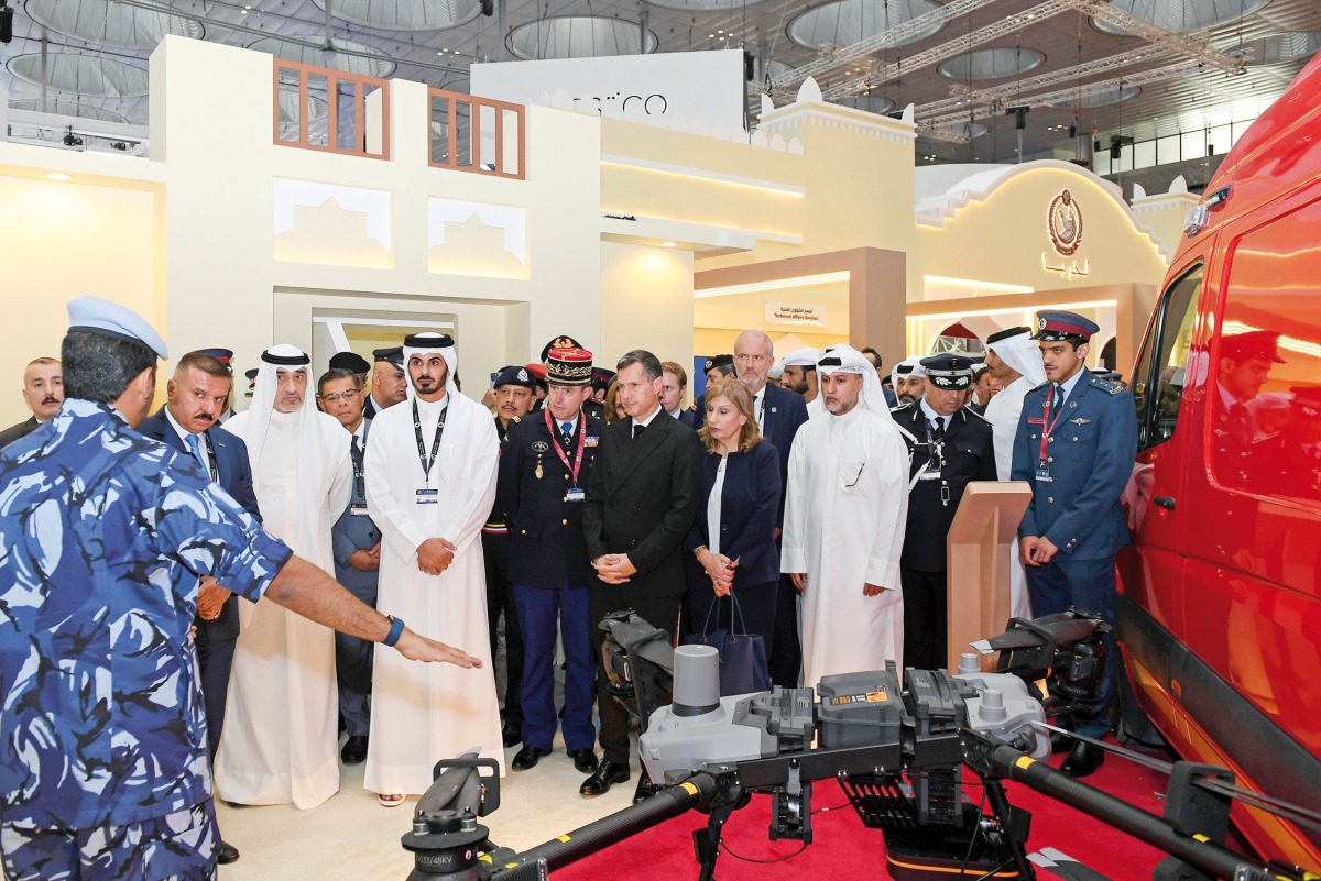 Minister of Interior and Commander of the Internal Security Force (Lekhwiya) H E Sheikh Khalifa bin Hamad bin Khalifa Al Thani with other dignitaries at the opening of Milipol Qatar at DECC yesterday. 