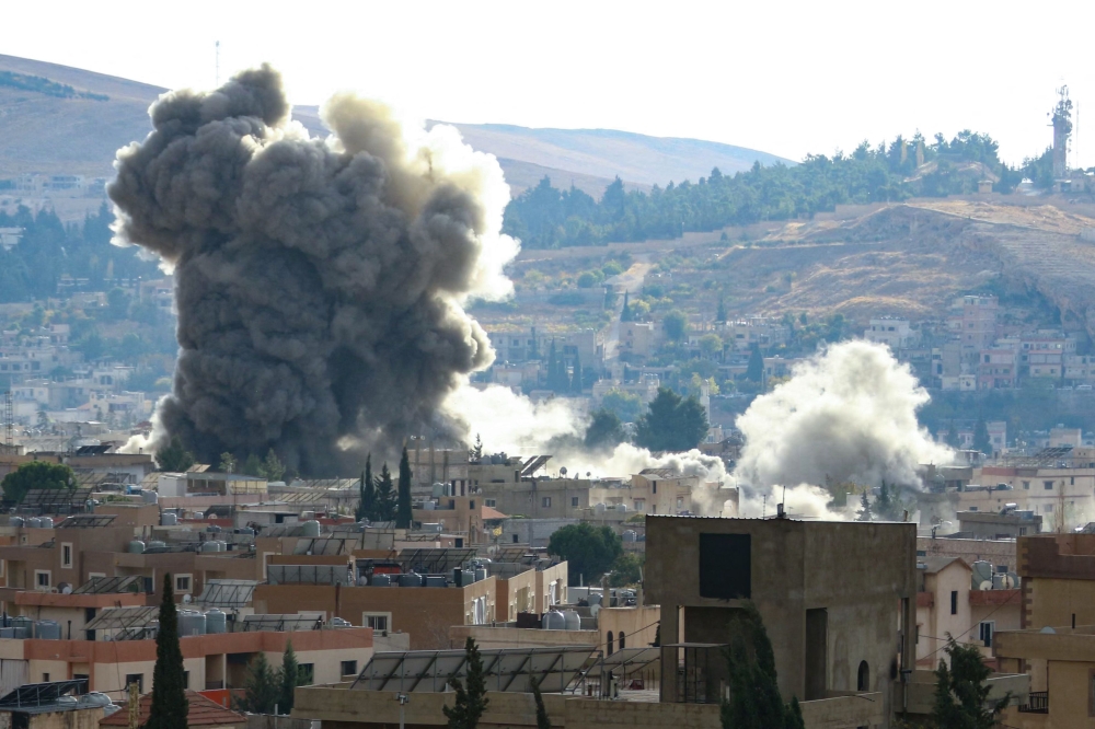 Smoke rises following an Israeli airstrike that targeted the eastern Lebanese city of Baalbeck on November 3, 2024. (Photo by Nidal Solh / AFP)