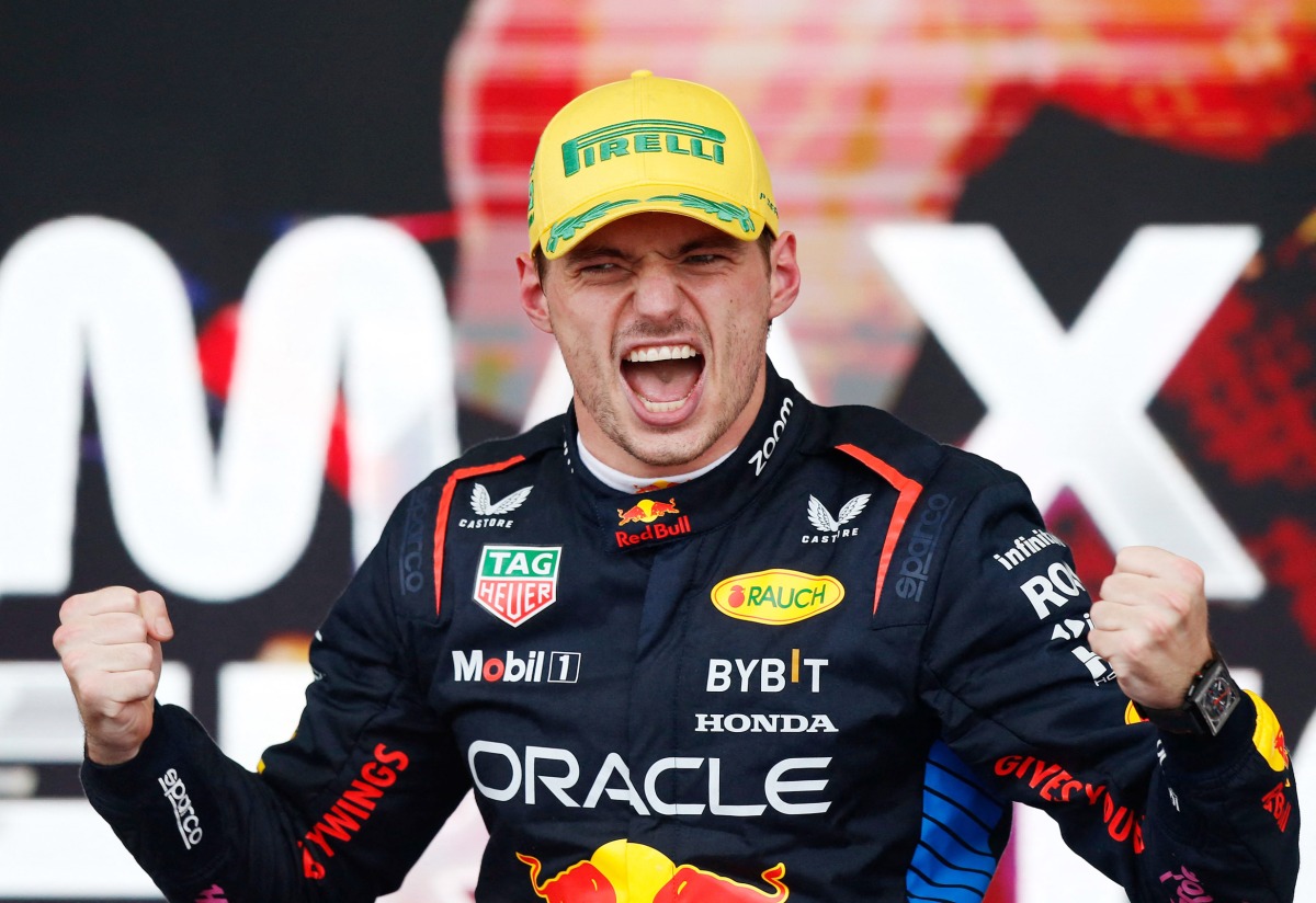 Red Bull Racing’s Dutch driver Max Verstappen celebrates after winning the Formula One Sao Paulo Grand Prix, on November 3, 2024.