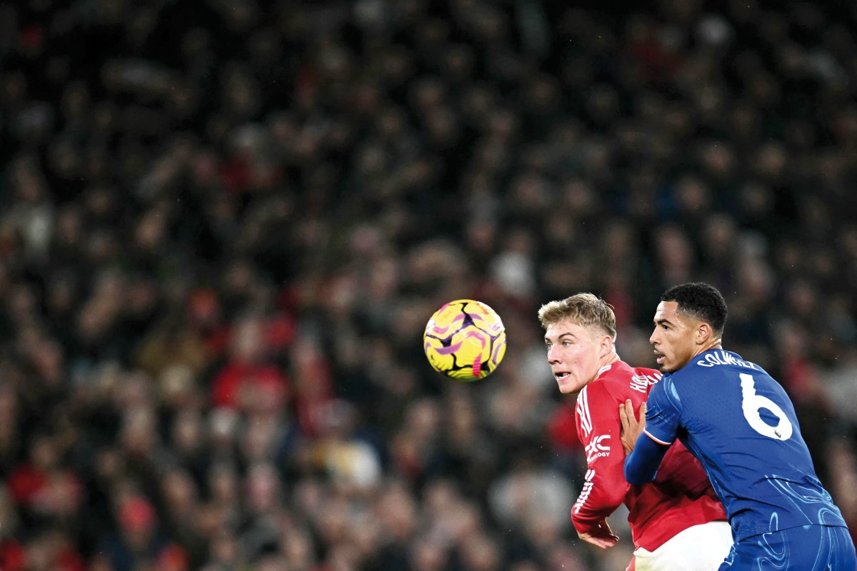 Manchester United’s Danish striker Rasmus Hojlund and Chelsea’s English defender Levi Colwill (right) focus on the ball during their match on November 4, 2024