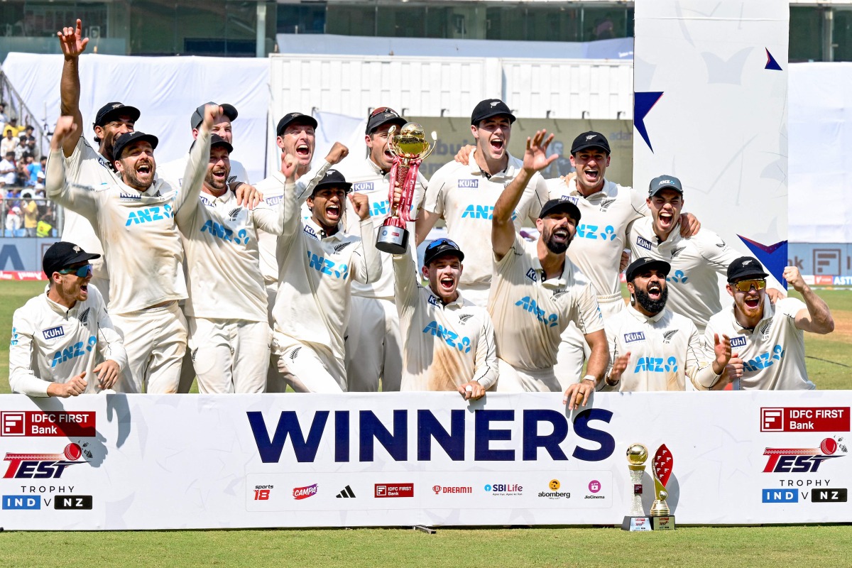 New Zealand players celebrate after the 3-0 series win against India, yesterday.