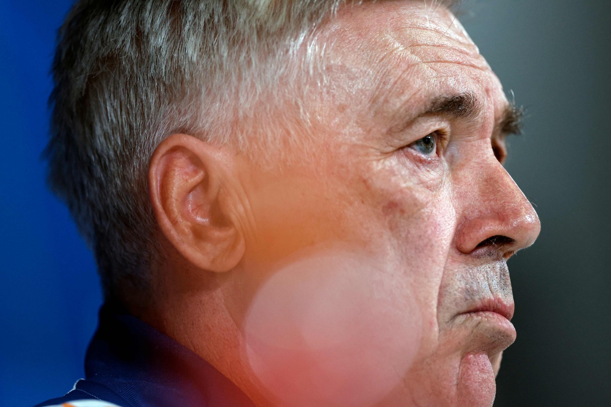 Real Madrid's Italian coach Carlo Ancelotti gives a press conference on the eve of their UEFA Champions League football match against AC Milan at the club's training facilities of Valdebebas, in the outskirt of Madrid, on November 04, 2024. (Photo by OSCAR DEL POZO / AFP)
