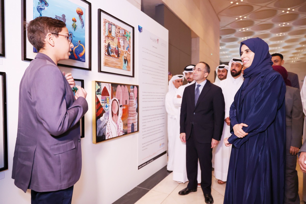 Minister of State for International Cooperation H E Lolwah bint Rashid Al Khater with other officials during the exhibition.