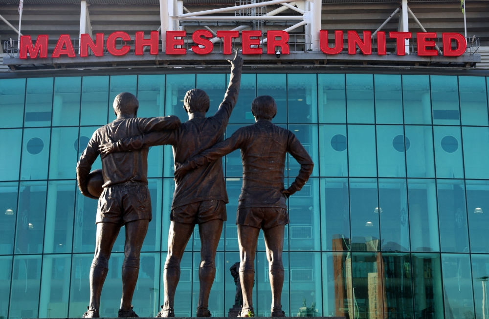 File photo: General view of the United Trinity statue outside Old Trafford. REUTERS/Phil Noble

