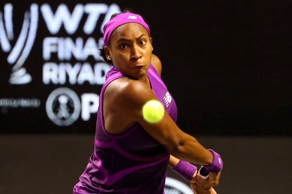 US' Coco Gauff returns the ball to Poland's Iga Swiatek during their women's singles tennis match at the WTA Finals Championship in Riyadh on November 5, 2024. (Photo by Fayez Nureldine / AFP)