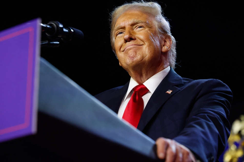 Republican presidential nominee, former U.S. President Donald Trump arrives to speak during an election night event at the Palm Beach Convention Center on November 06, 2024 in West Palm Beach, Florida. Chip Somodevilla/Getty Images/AFP 