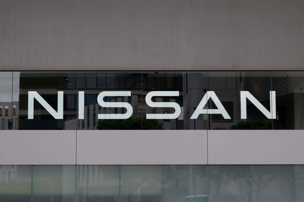 This file photo taken on May 9, 2024 shows the logo of Japanese automaker Nissan Motor at the company's head office in Yokohama. Photo by Yuichi YAMAZAKI / AFP