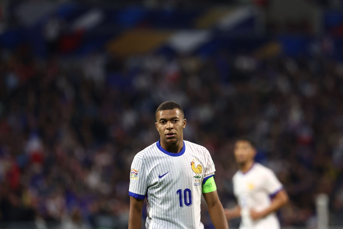 (FILES) France's forward #10 Kylian Mbappe looks on during the UEFA Nations League, League A - Group 2 first leg football match between France and Belgium at the Parc Olympique Lyonnais in Lyon on September 9, 2024. (Photo by Franck FIFE / AFP)
