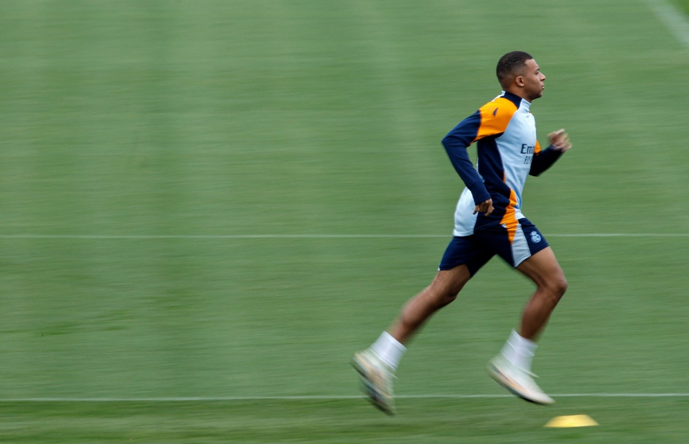 Real Madrid's French forward #09 Kylian Mbappe attends a training session at the club's training facilities of Valdebebas, in the outskirts of Madrid, on November 8, 2024, on the eve of their Spanish league football match against CA Osasuna. (Photo by Oscar Del Pozo / AFP)