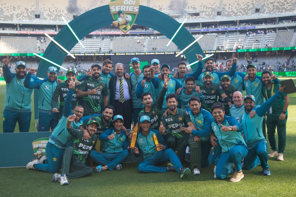 Pakistan's players and officials celebrate winning the series after their victory in the third one-day International (ODI) cricket match between Australia and Pakistan at Perth Stadium in Perth on November 10, 2024. (Photo by David Woodley / AFP) 