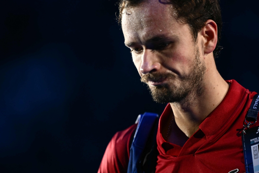 Russia's Daniil Medvedev leave the court after being defeated by USA's Taylor Fritz at the ATP Finals tennis tournament in Turin on November 10, 2024. (Photo by Marco BERTORELLO / AFP)