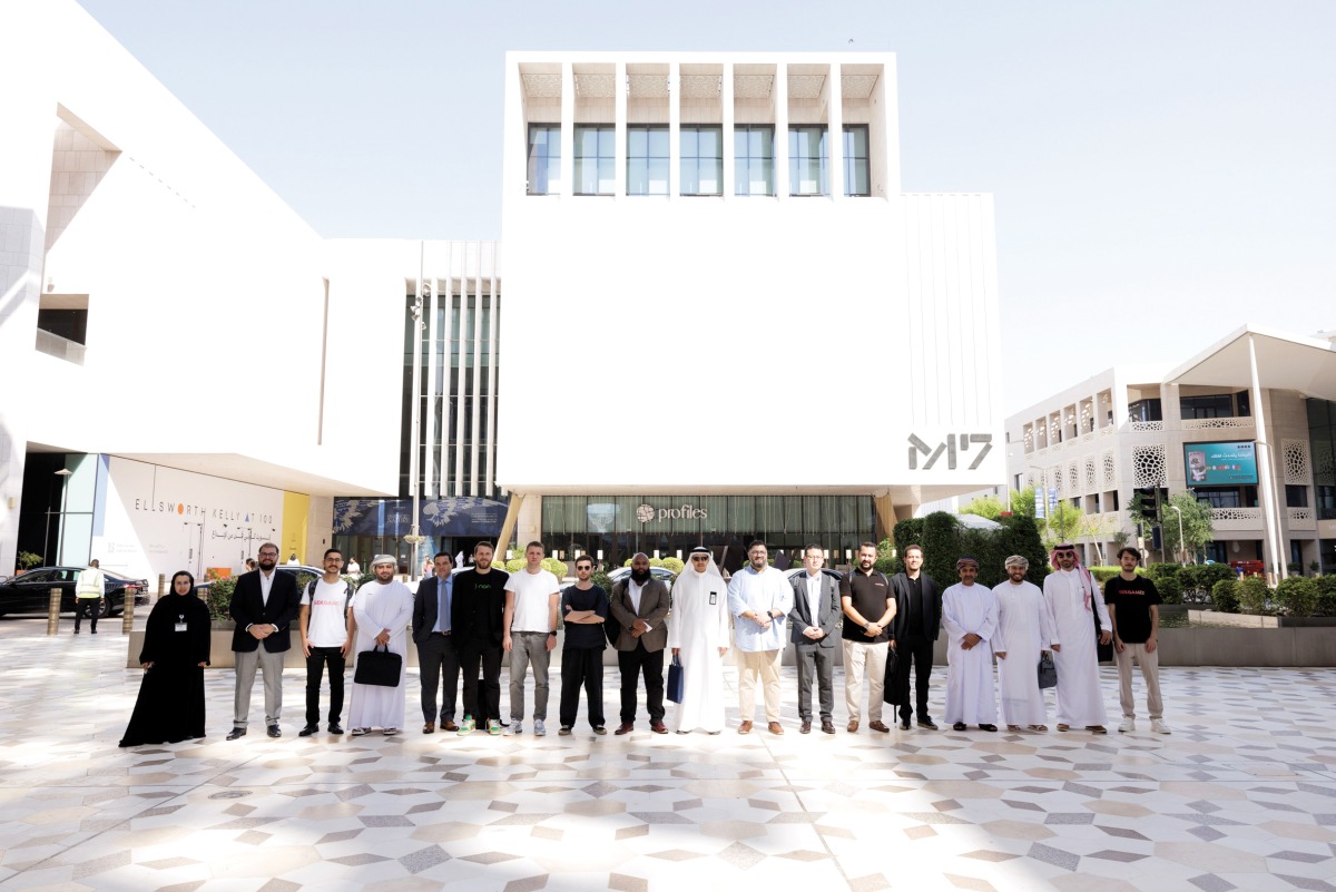 Applicants pose for a photo in Msheireb, Doha.