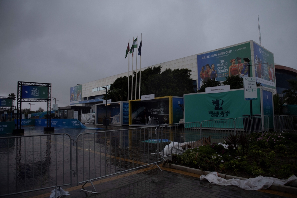 A picture taken on November 13, 2024 shows a view of the Palacio de Deportes Jose Maria Martin Carpena in Malaga closed due to heavy rain. (Photo by Jorge Guerrero / AFP)