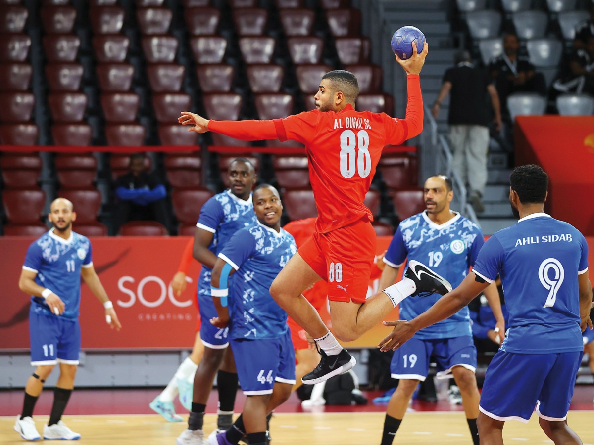 An Al Duhail player prepares to score a goal.