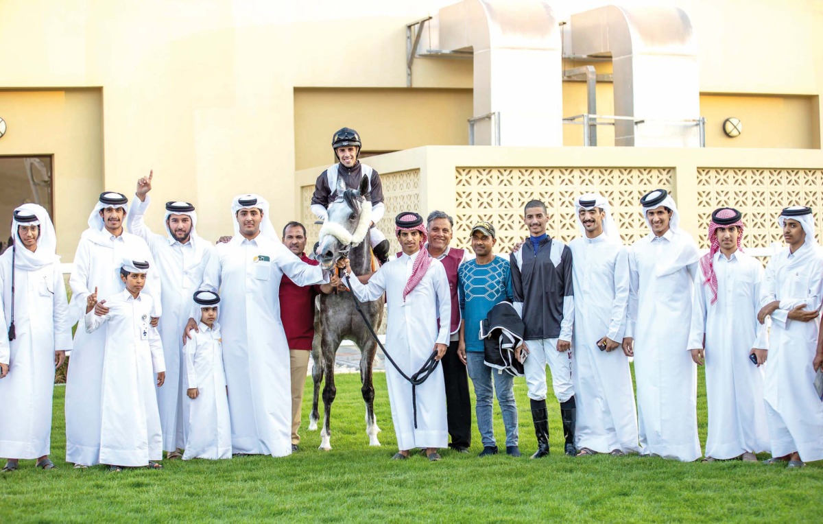 The connections of Medan celebrate after the Hassan bin Ali Hassan Al Matwi-owned six-year-old mare won the Umm Bab Cup.