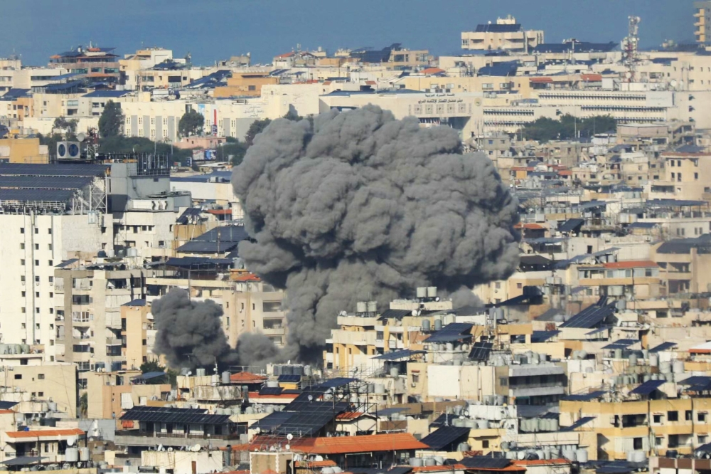 Smoke rises from the site of an Israeli airstrike that targeted the district of Haret Hreik in Beirut's southern suburbs on November 16, 2024 (Photo by AFP)