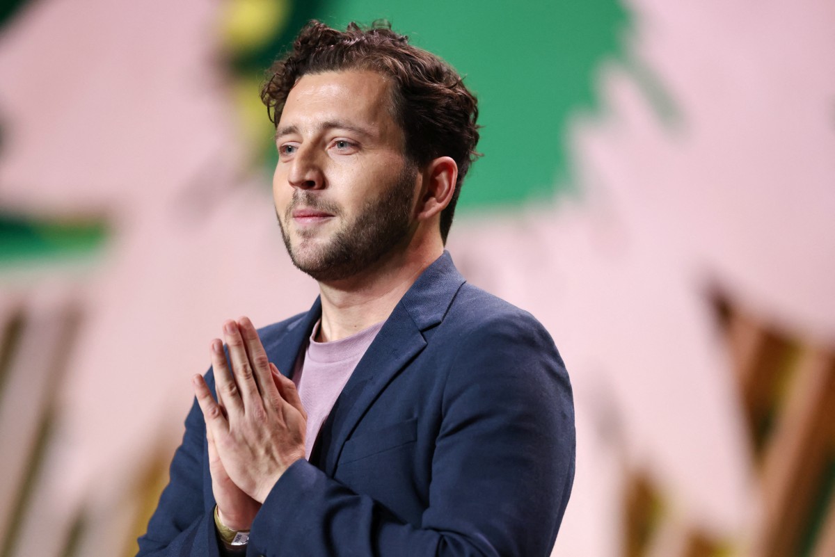 Felix Banaszak, MP of Germany's Greens and candidate for the party's leadership, gestures as he delivers a speech on the second day of the 50th Federal Delegates Conference of the Alliance 90/The Greens party (Buendnis 90 / Die Gruenen) in Wiesbaden, western Germany on November 16, 2024. The party congress takes place until November 17, 2024. Photo by Daniel ROLAND / AFP.