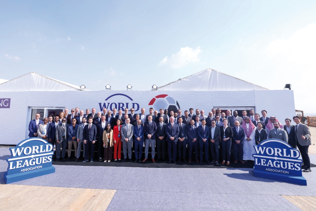 The participating officials pose for a photograph during the annual meeting of World Leagues Association in Cairo.