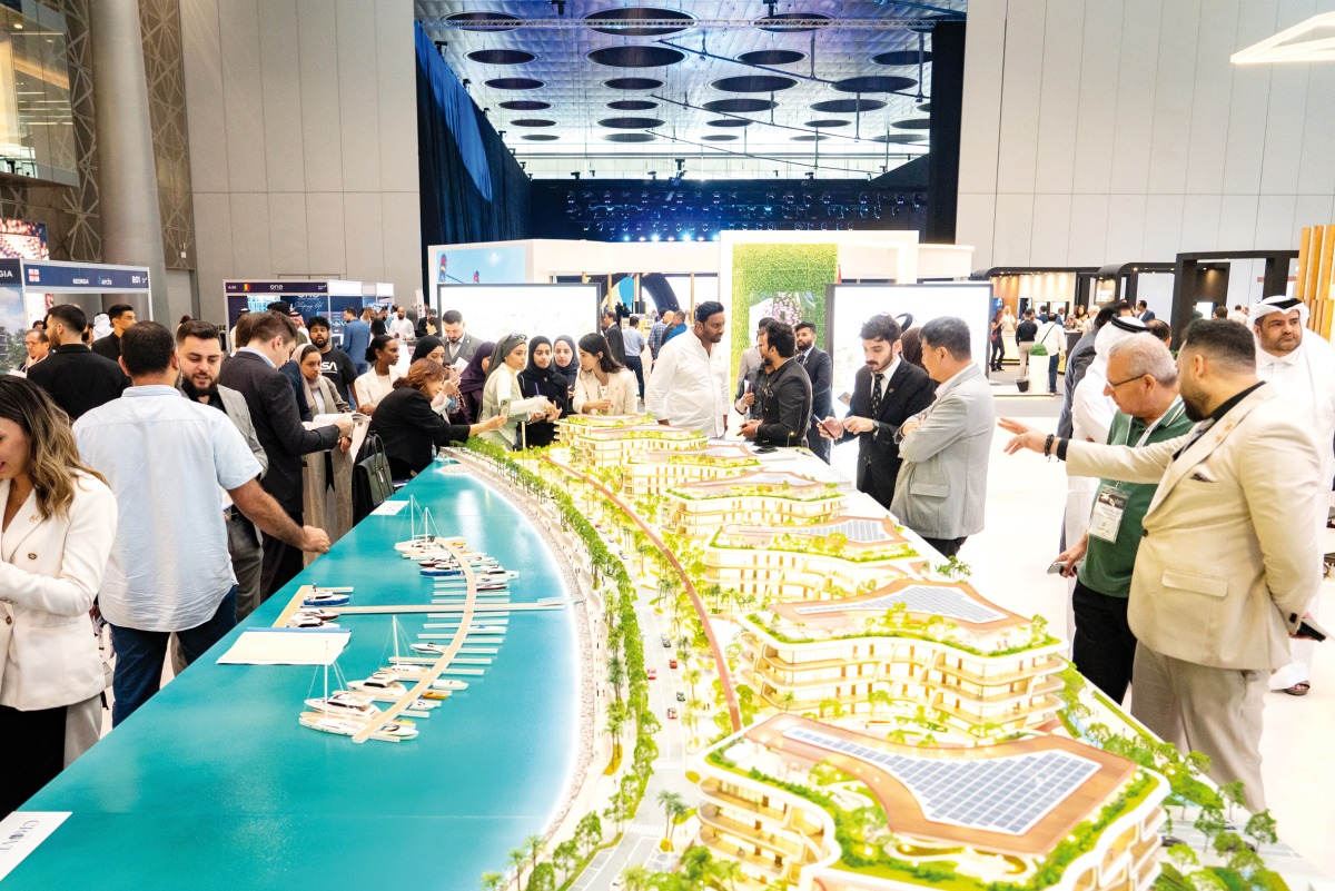 Participants visiting an exhibiting stand at Cityscape 2024.