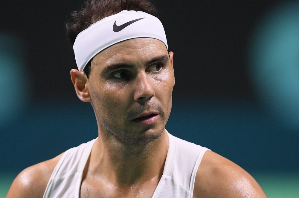 Spain's Rafael Nadal looks on as he trains ahead of the Davis Cup tennis tournament finals at the Palacio de Deportes Jose Maria Martin Carpena in Malaga, on November 18, 2024. (Photo by Jorge Guerrero / AFP)