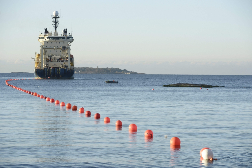 This picture taken on October 12, 2015 shows the C-Lion1 submarine telecommunications cable being laid to the bottom of the Baltic Sea by cable laying ship 