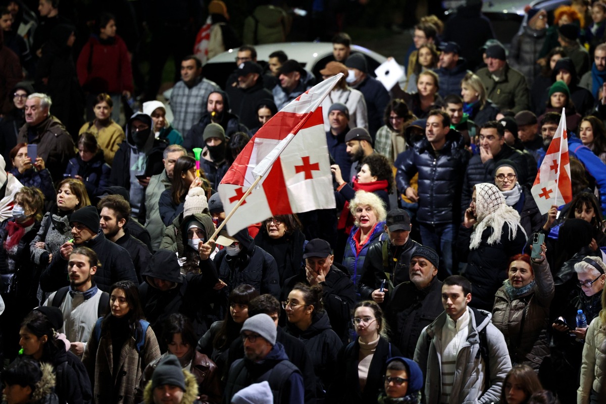 Georgian opposition supporters protest against the results of the last month's parliamentary elections in Tbilisi on November 19, 2024. (Photo by Giorgi ARJEVANIDZE / AFP)

