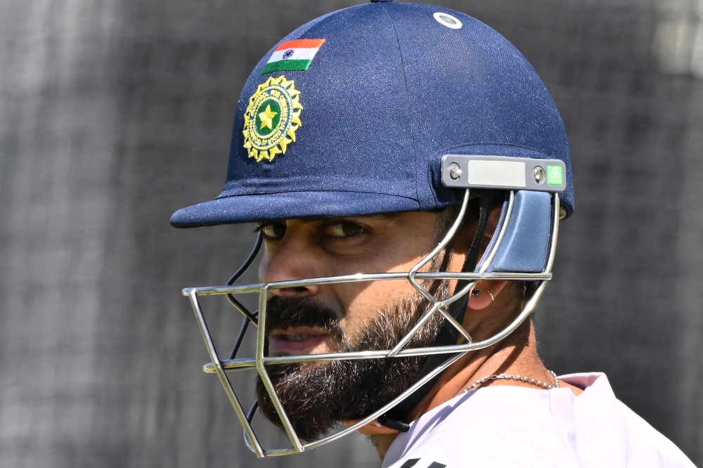 India's Virat Kohli prepares to bat during a practice session at the Optus Stadium in Perth on November 20, 2024. (Photo by Saeed Khan / AFP) 