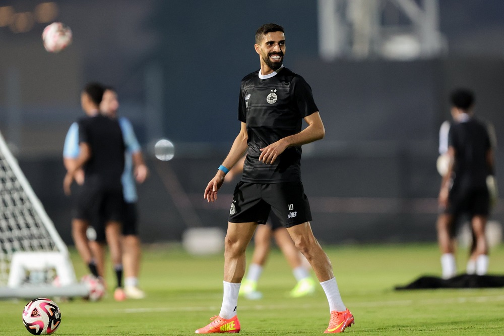 Al Sadd's Hassan Al Haydos attends a training session.