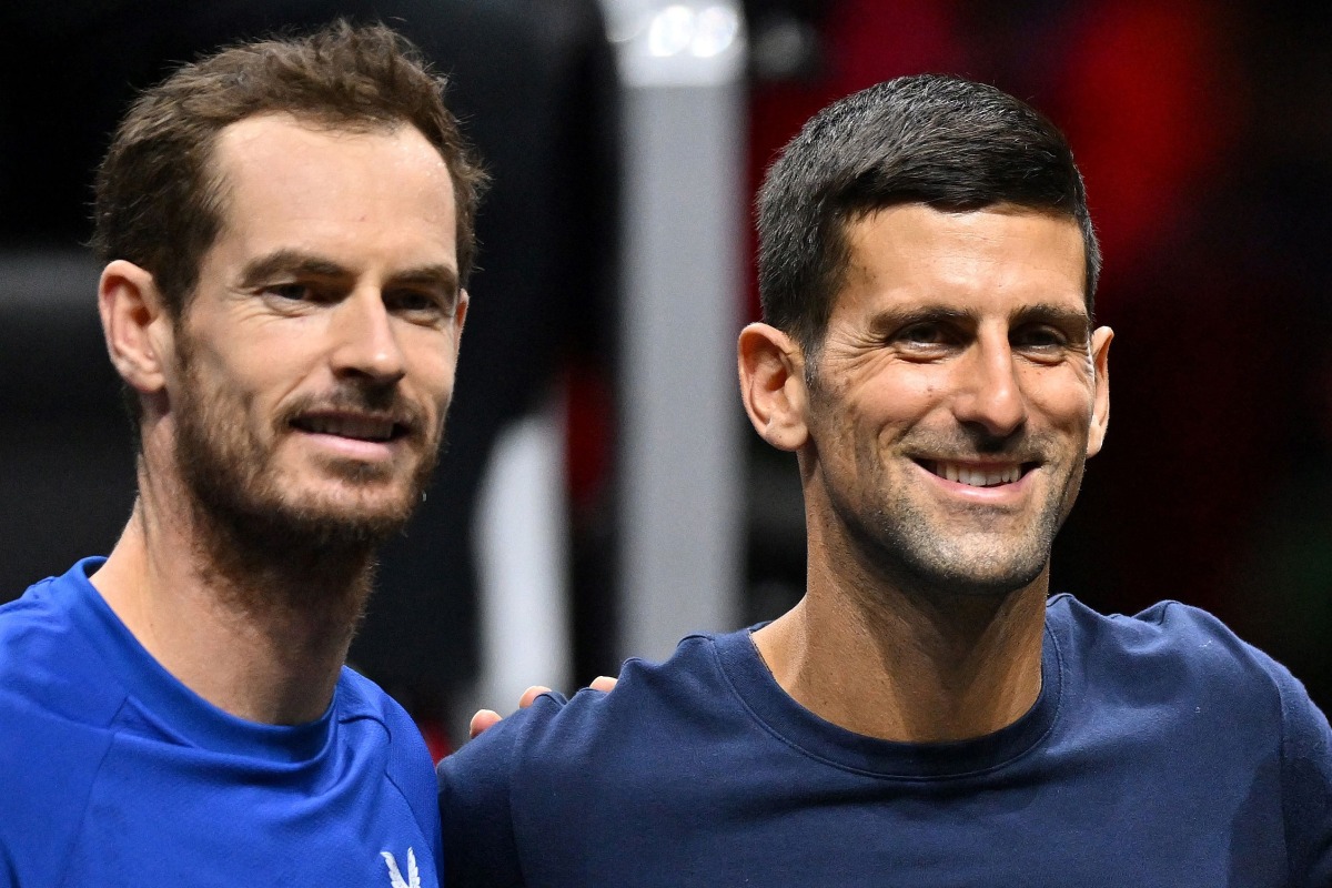 (FILES) (L-R) Britain's Andy Murray and Serbia's Novak Djokovic with (unseen) Switzerland's Roger Federer and Spain's Rafael Nadal pose during a Team Europe practice session ahead of the 2022 Laver Cup at the O2 Arena in London on September 22, 2022. (Photo by Glyn KIRK / AFP)
