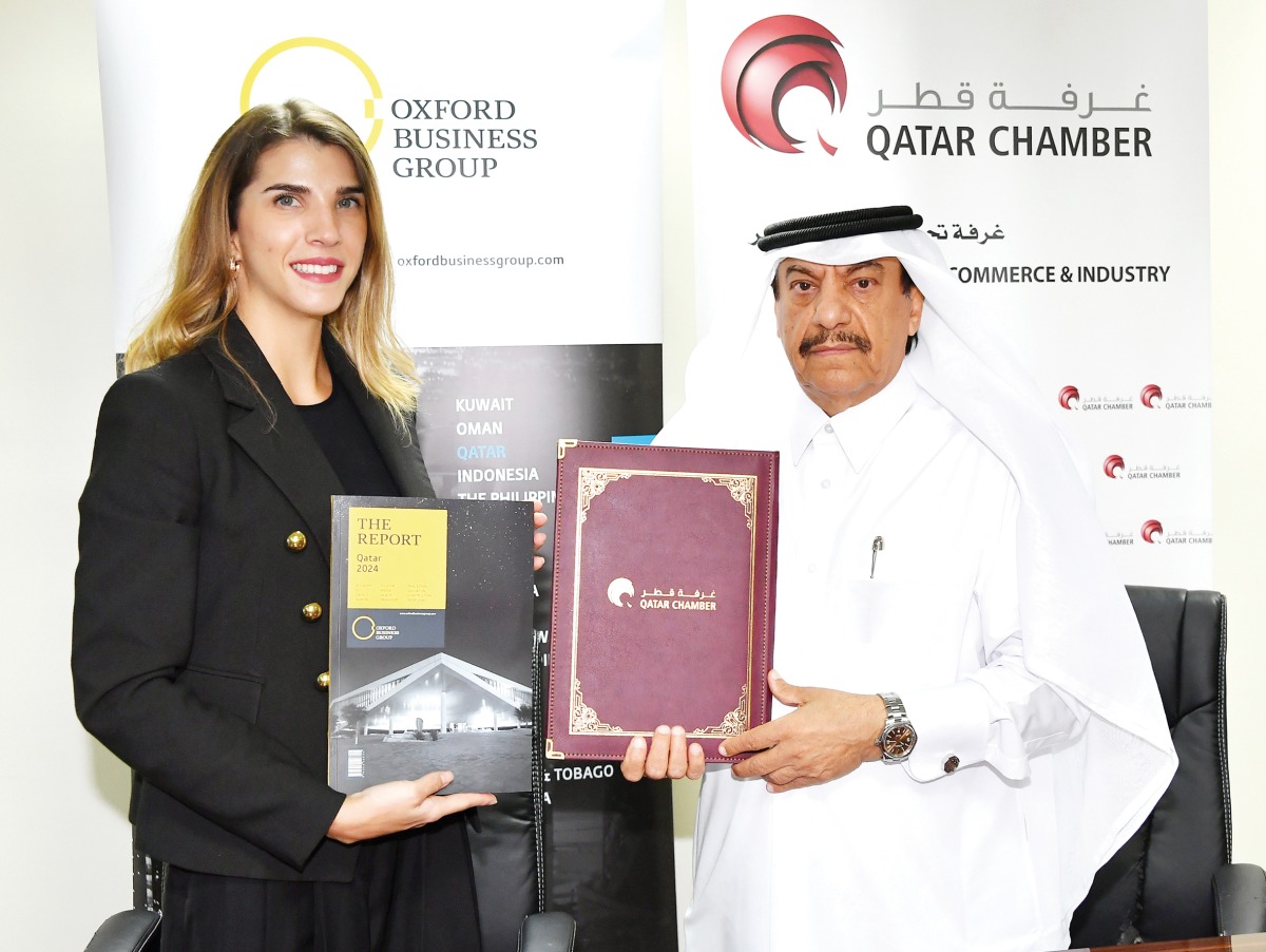 General Manager of Qatar Chamber Ali Busharbak Al Mansouri and OBG’s Country Director for Qatar Fernanda Braz during the MoU signing. 